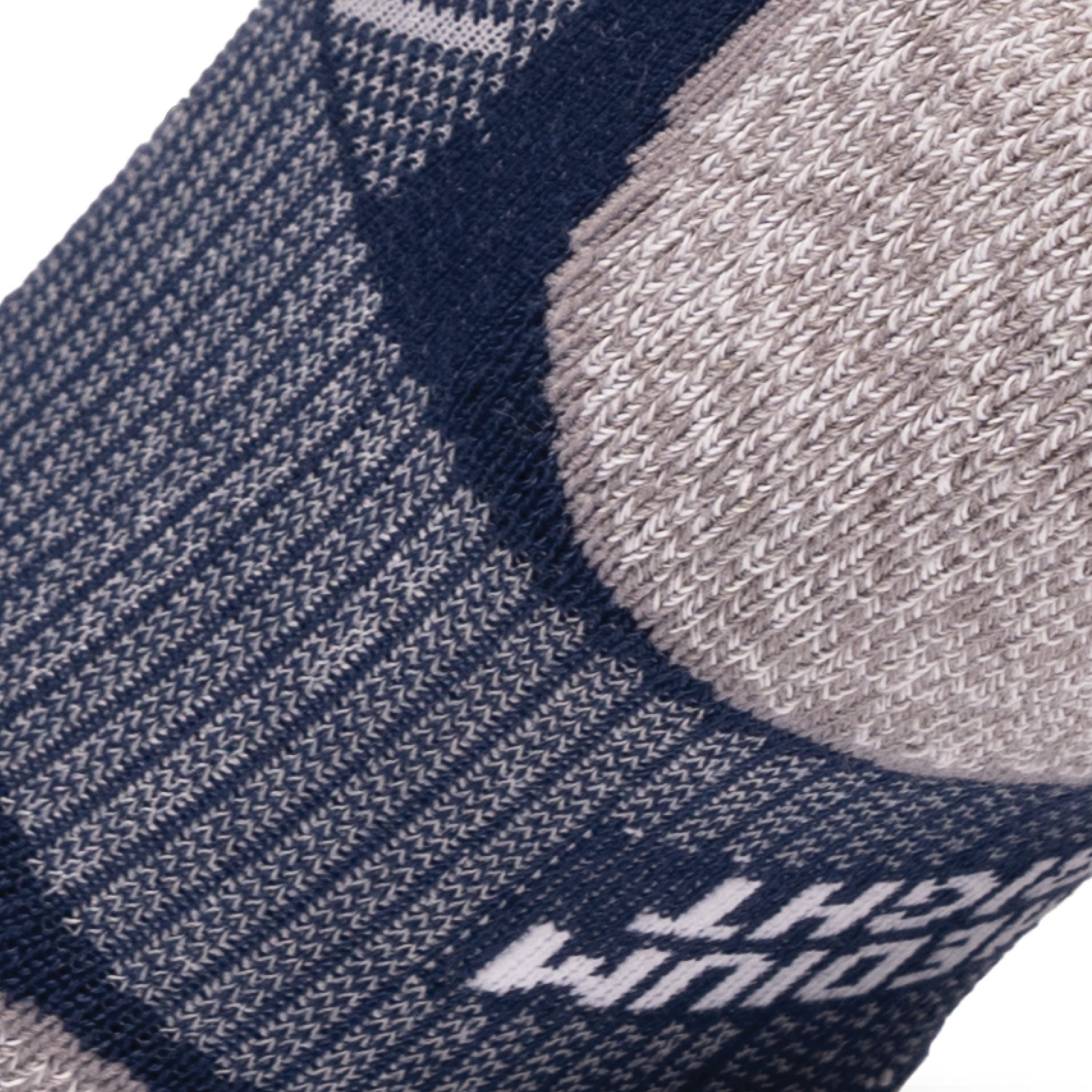 Close up view of elastic arch of Lightfeet Evolution Trail Navy Half Crew Performance Running Sock