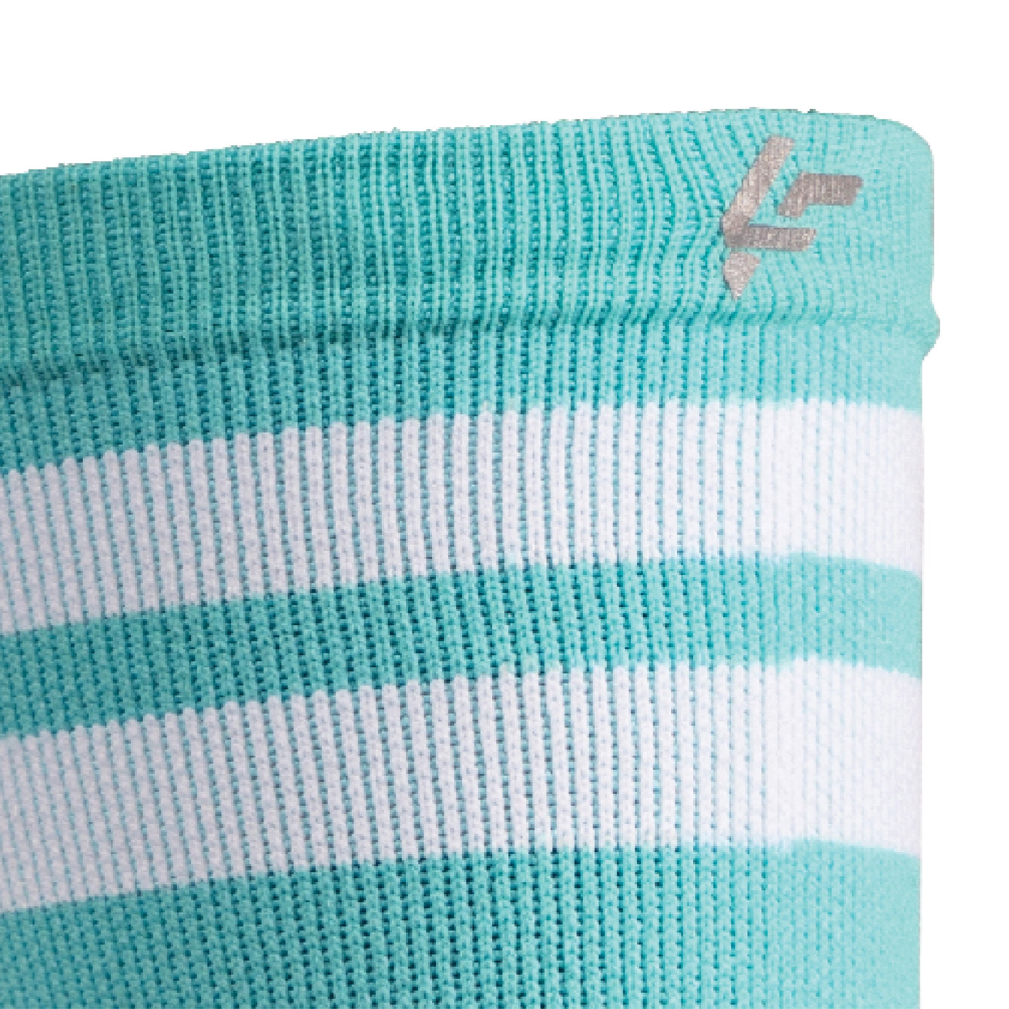 Close up view of reflective print symbol on Lightfeet Performance 2 Stripes Mint Half Crew Sock