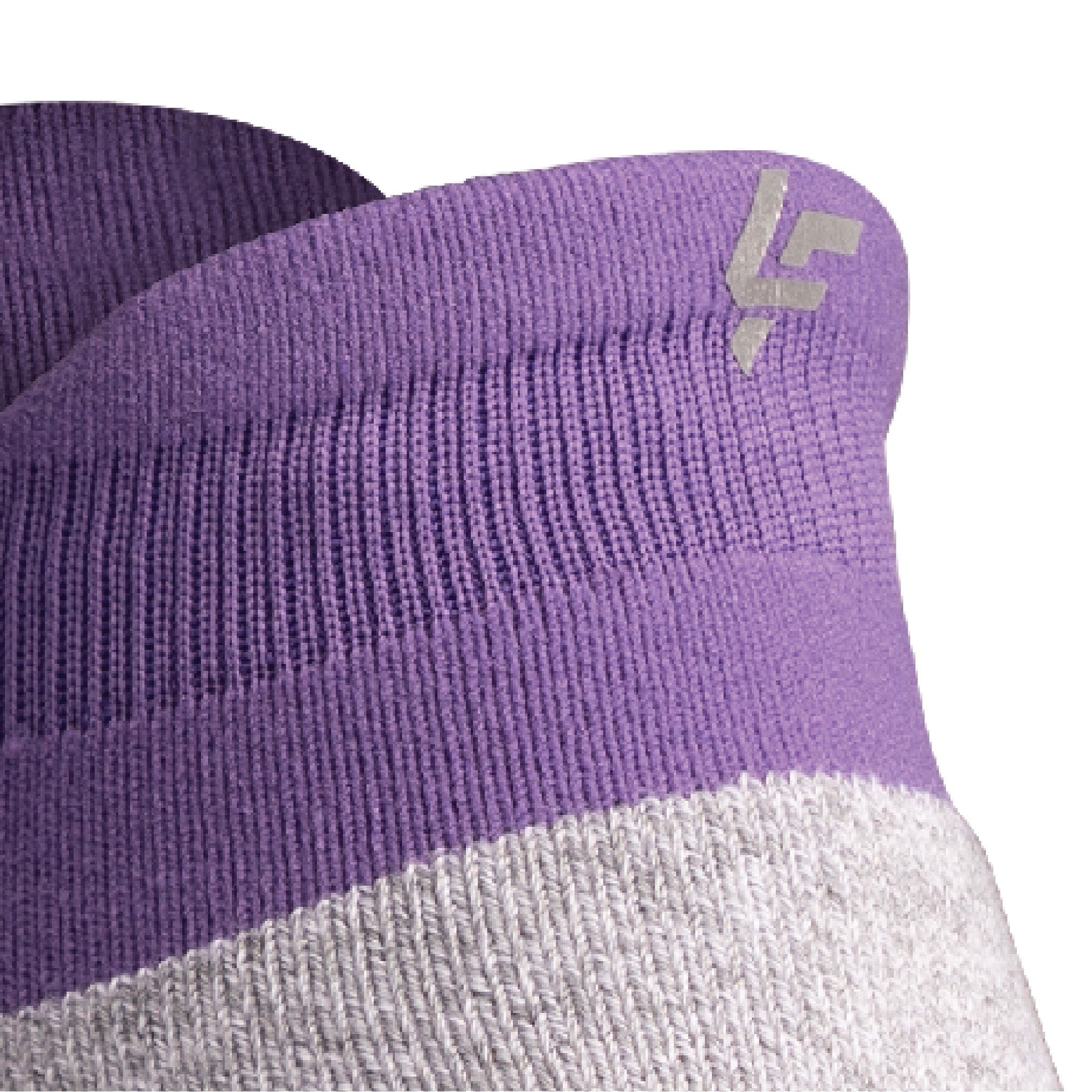 Close up view of reflective symbol on Lightfeet Performance Violet Ankle Sock