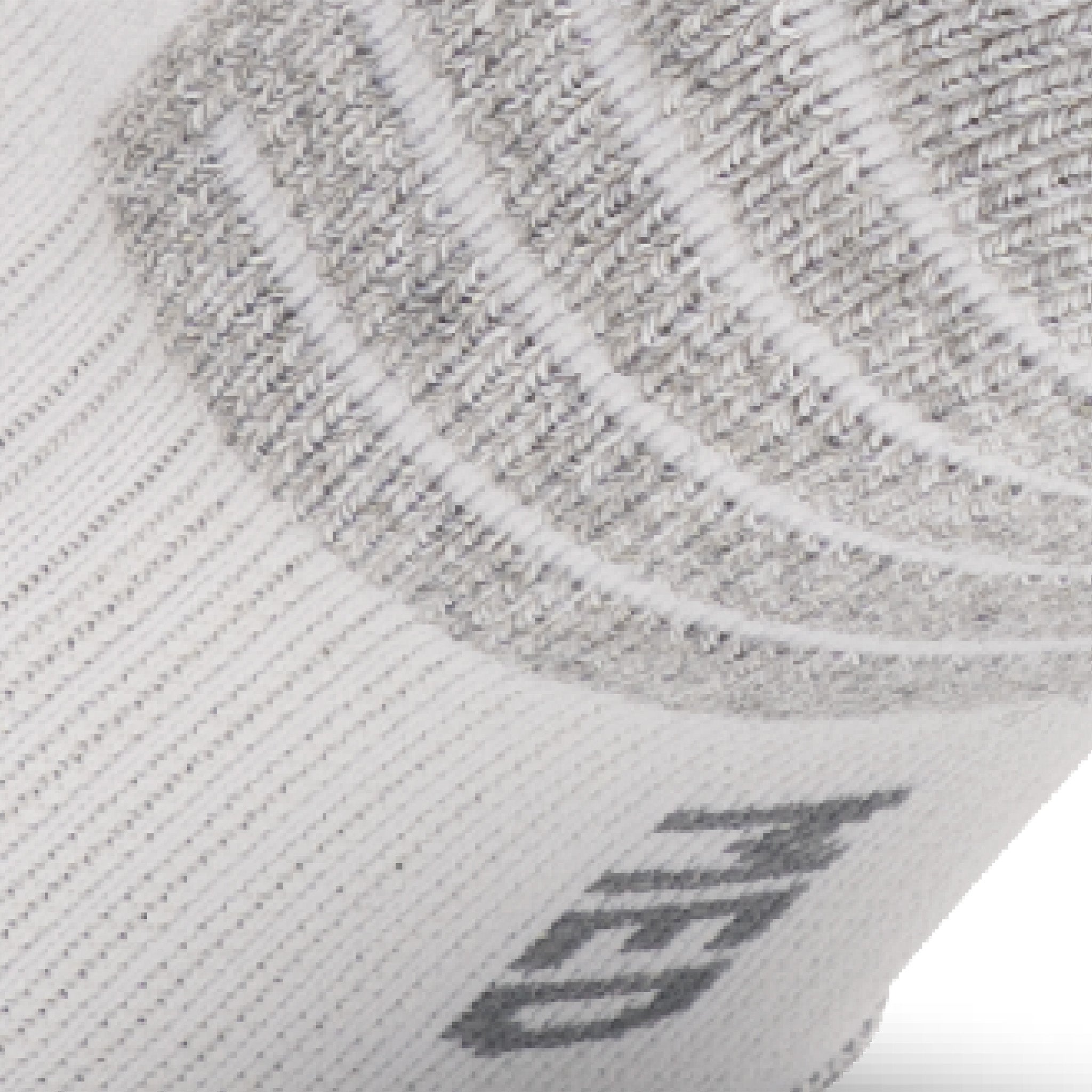 Close up view of elastic arch of Lightfeet Performance White Ankle Sock