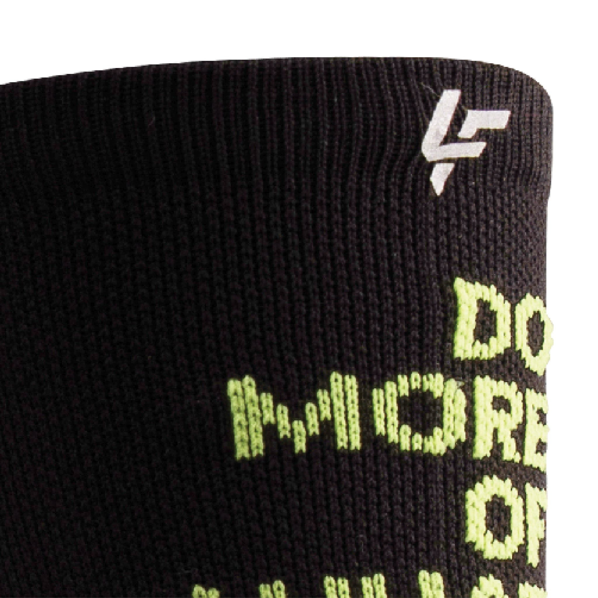 Close up view of reflective print symbol on Lightfeet Performance Do More Of What You Love Black Yellow Aqua Crew Socks