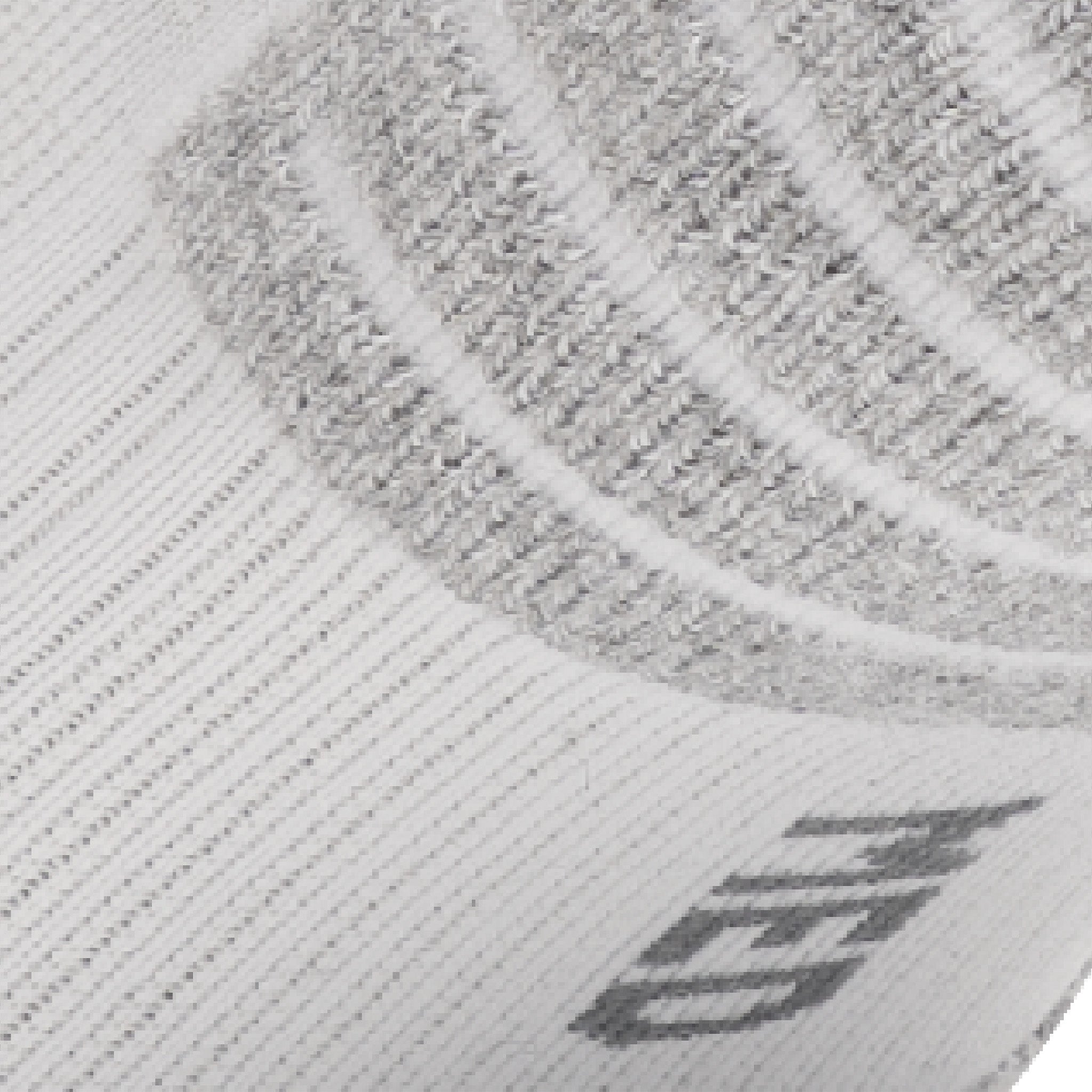 Close up view of elastic arch of Lightfeet Performance White Half Crew Sock