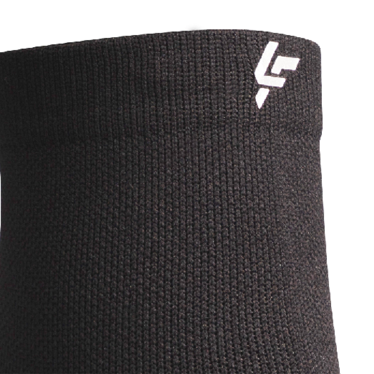 Close up view of reflective symbol on Lightfeet Performance Black Quarter Crew Sock