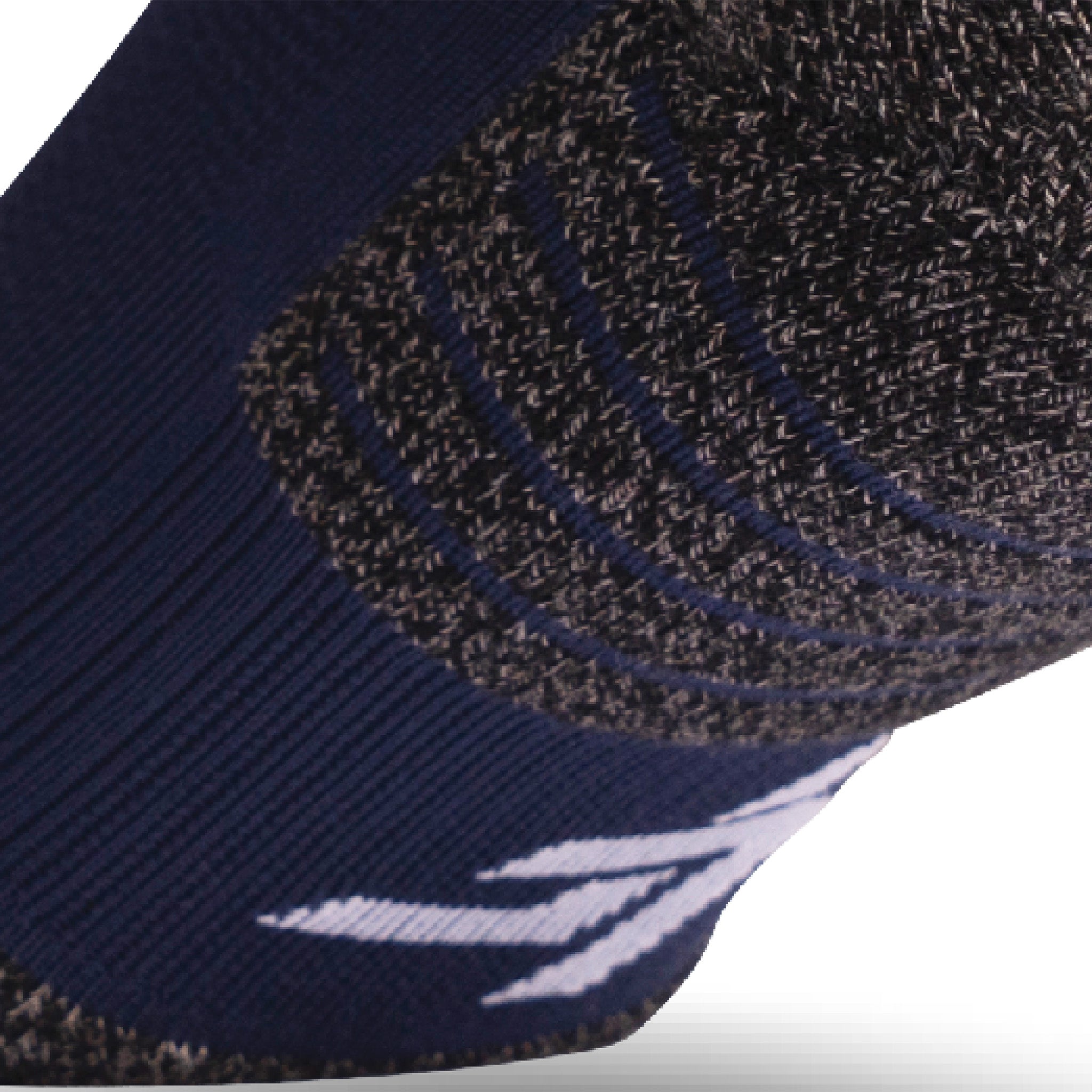 Close up view of elastic arch of Lightfeet Performance Navy Quarter Crew Sock