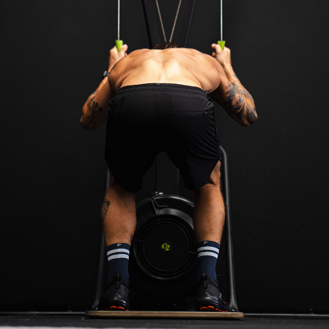 Image of person wearing Lightfeet Performance 2 Stripes Navy Half Crew Socks