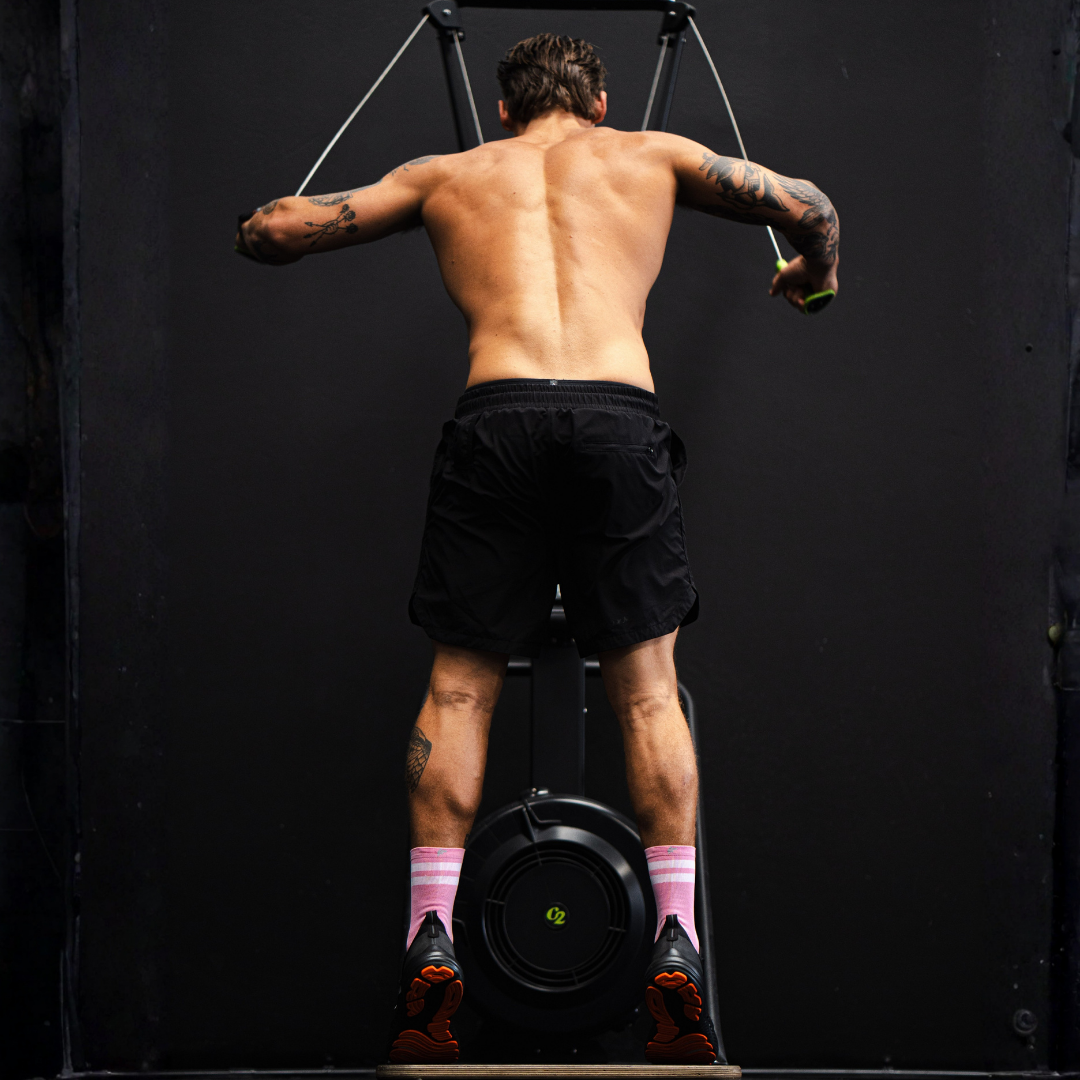 Image of person wearing Lightfeet Performance 2 Stripes Soft Pink Half Crew Socks