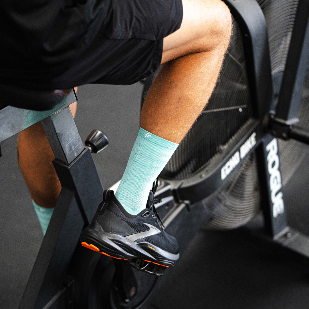 Image of person wearing Lightfeet Performance Raster Mint Half Crew Socks