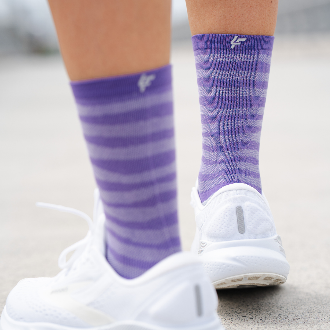 Image of person wearing Lightfeet Performance Raster Violet Half Crew Socks