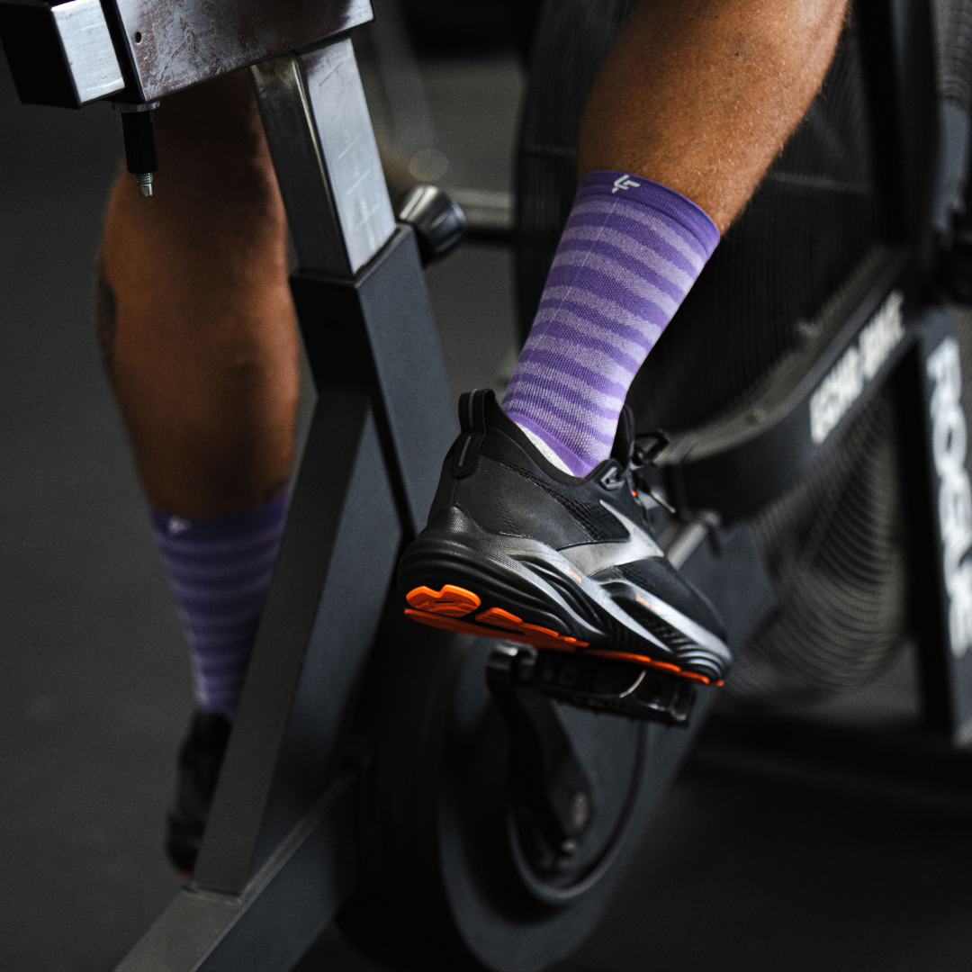Image of person wearing Lightfeet Performance Raster Violet Half Crew Socks