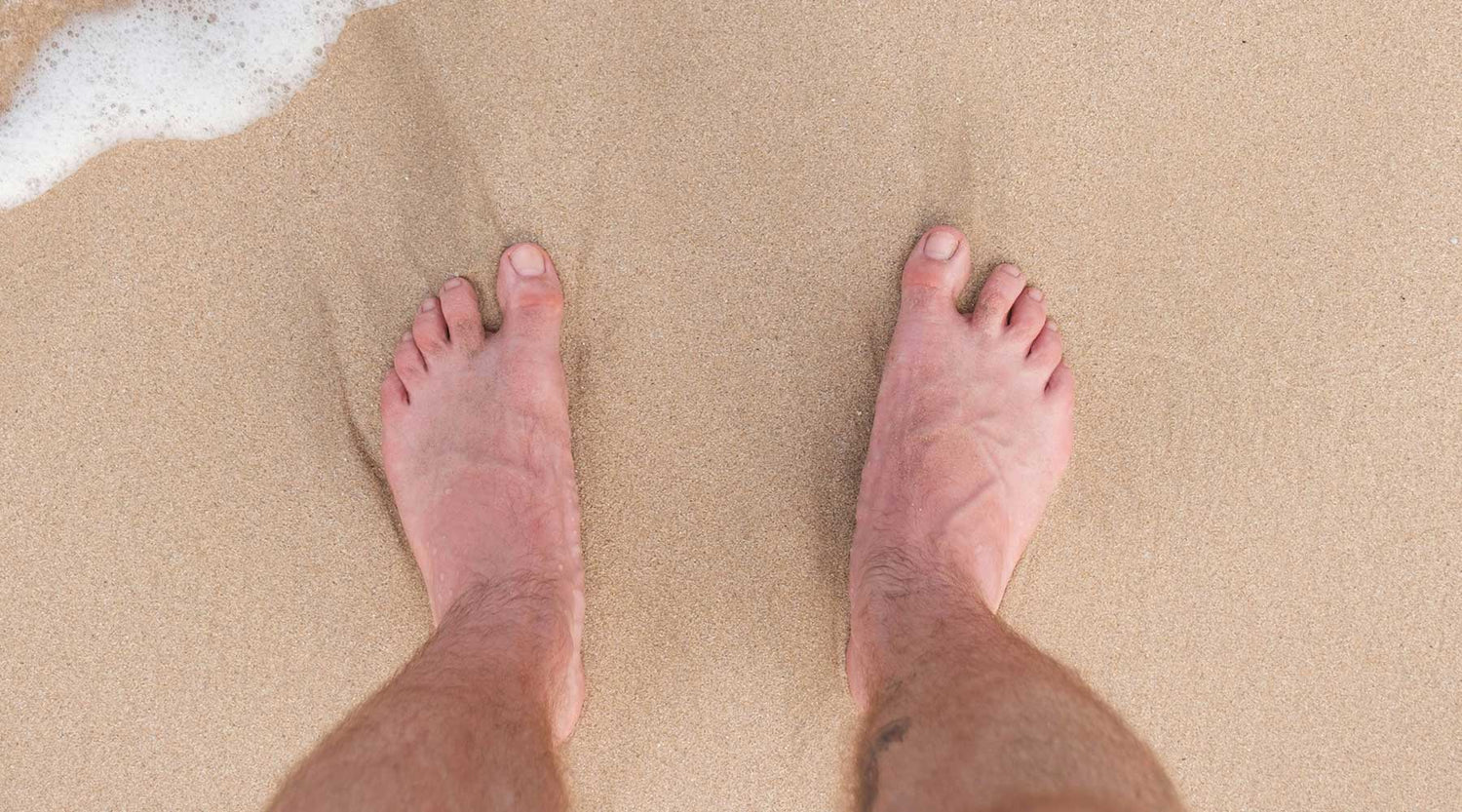 Bare feet on sand