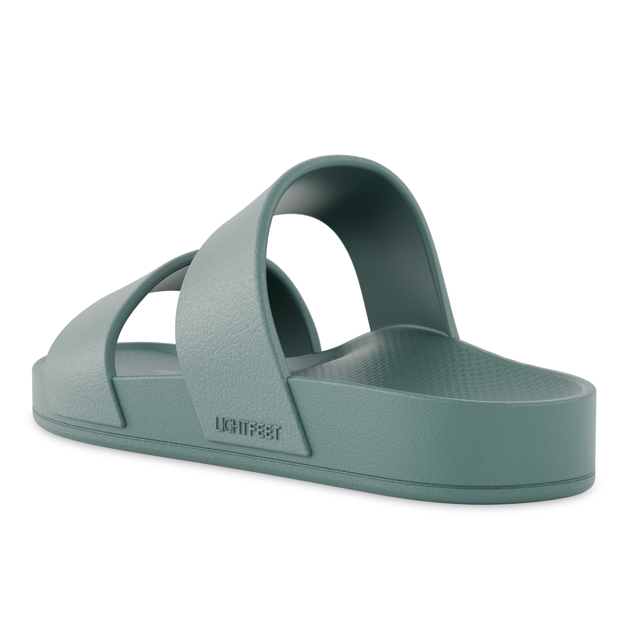 Green slide sandal on a white background