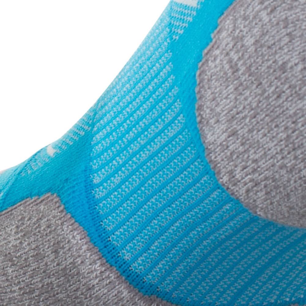 Close up view of elastic arch of Lightfeet Evolution Aqua Mini Crew Performance Sock 