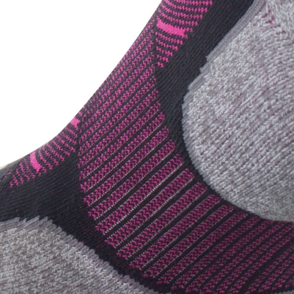 Close up view of elastic arch of Lightfeet Evolution Black Fluro Pink Mini Crew Performance Running Sock 