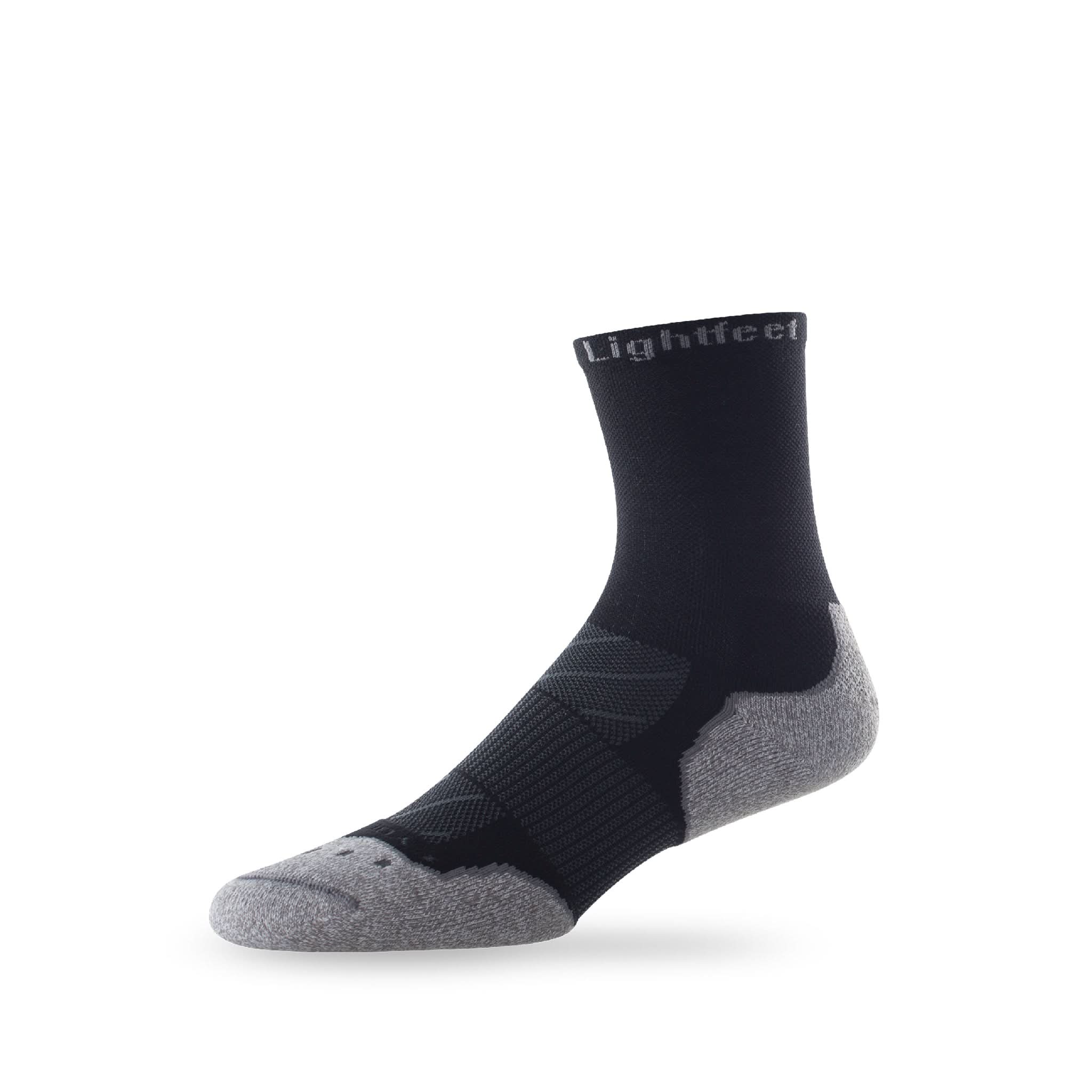 Side view of Lightfeet Evolution Black Half Crew Performance Running Sock 