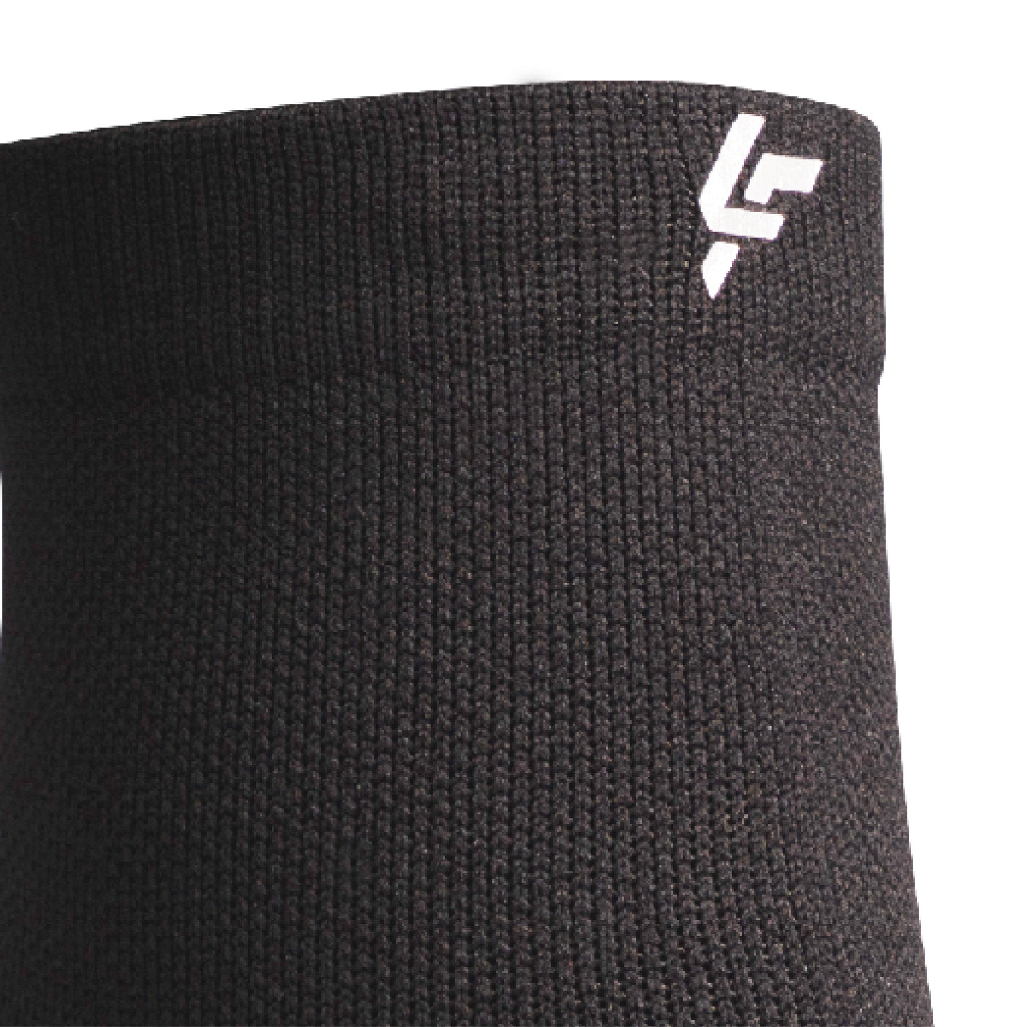 Close up view of reflective symbol on Lightfeet Performance Black Quarter Crew Sock 