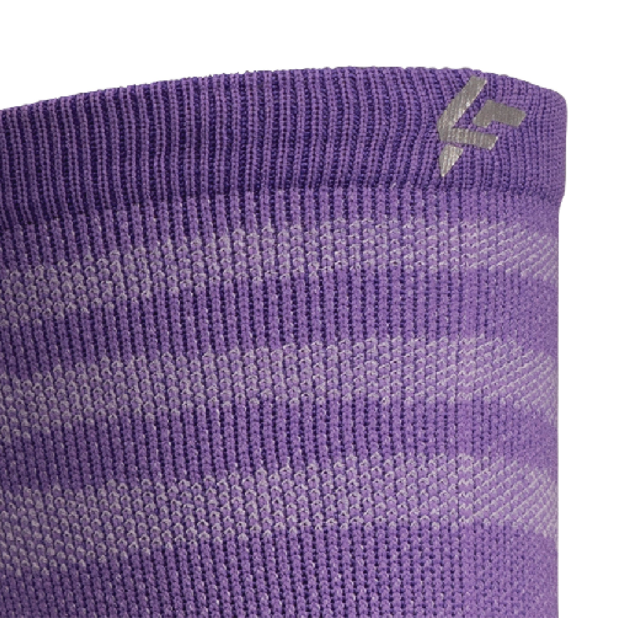 Close up view of reflective print symbol on Lightfeet Performance Raster Violet Half Crew Sock 