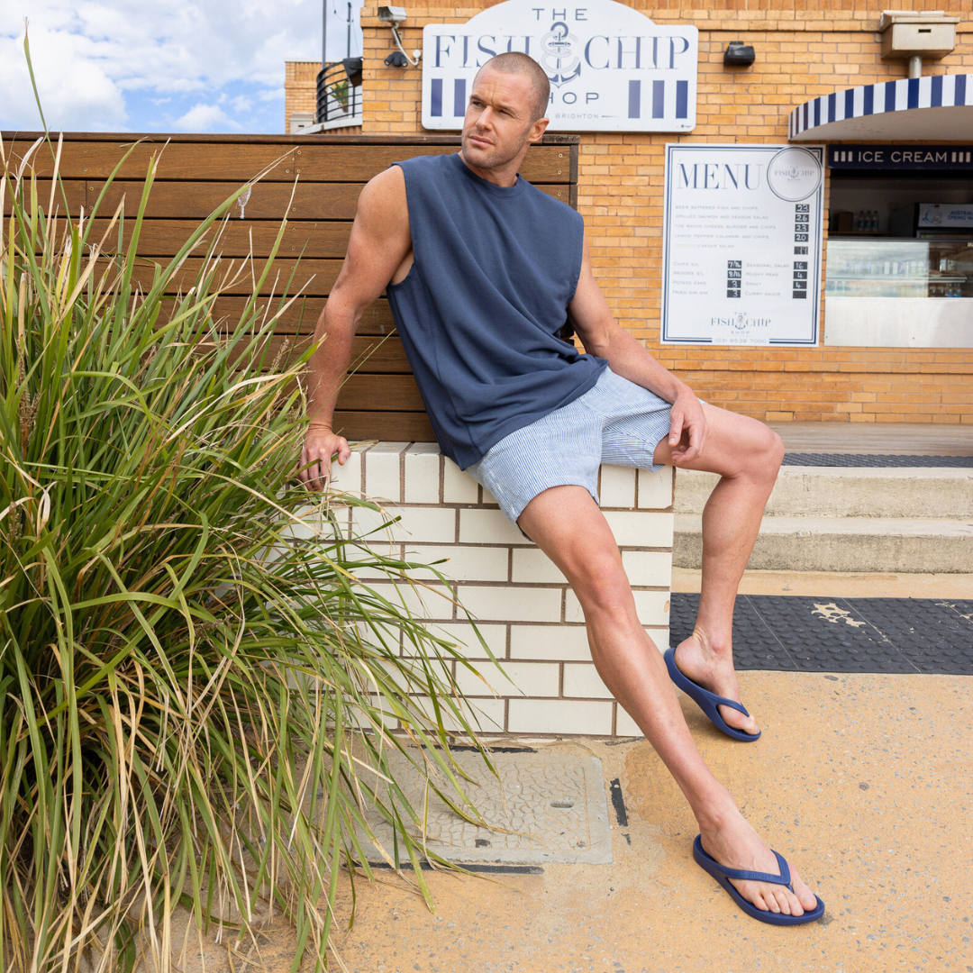 Person wearing Navy Lightfeet Arch Support Thongs